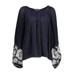 Kocca Blu Viscosa Donna Camicia featuring a lightweight, flowy blue viscose fabric with a classic button-up design.