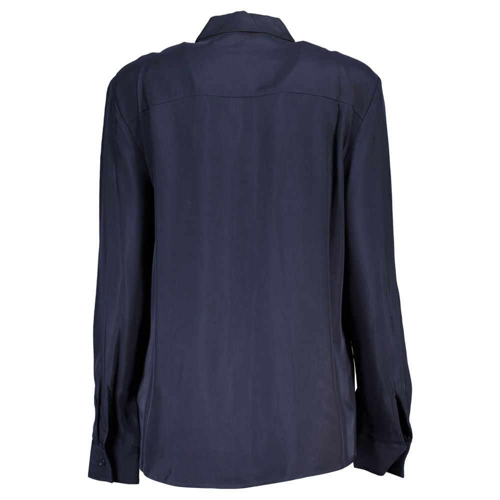 Blue viscose women's shirt by Tommy Hilfiger, featuring a relaxed fit and classic collar, displayed on a hanger.