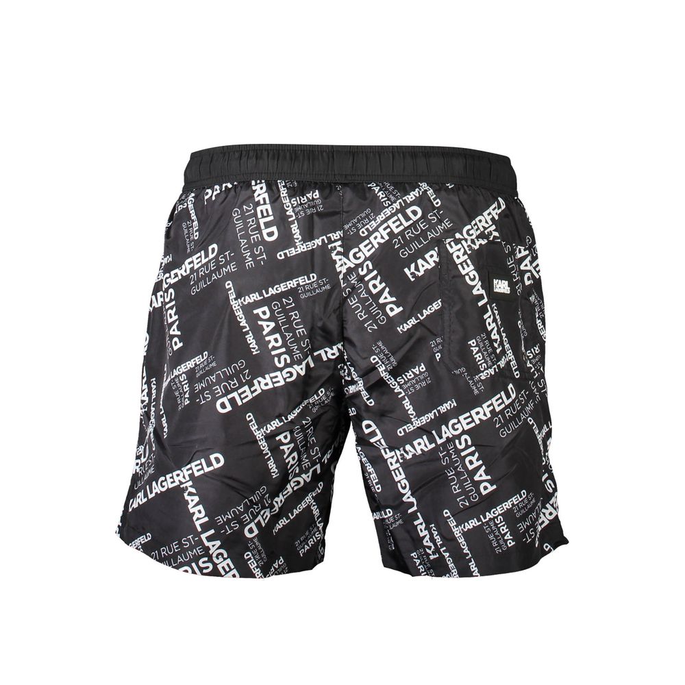 Black polyester men's swim boxer by Karl Lagerfeld featuring a fitted design and logo waistband.