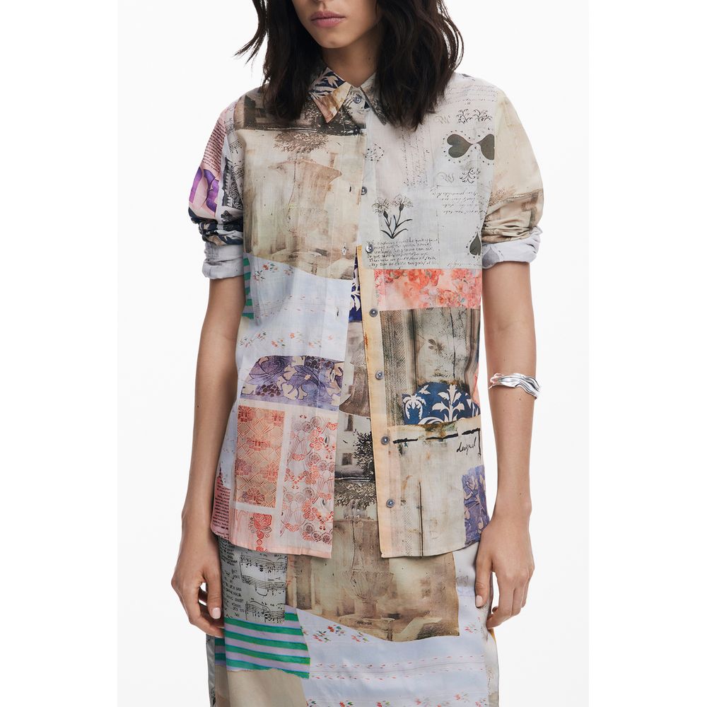 Desigual beige cotton women's shirt with a relaxed fit and button-up front, displayed hanging on a wooden hanger.