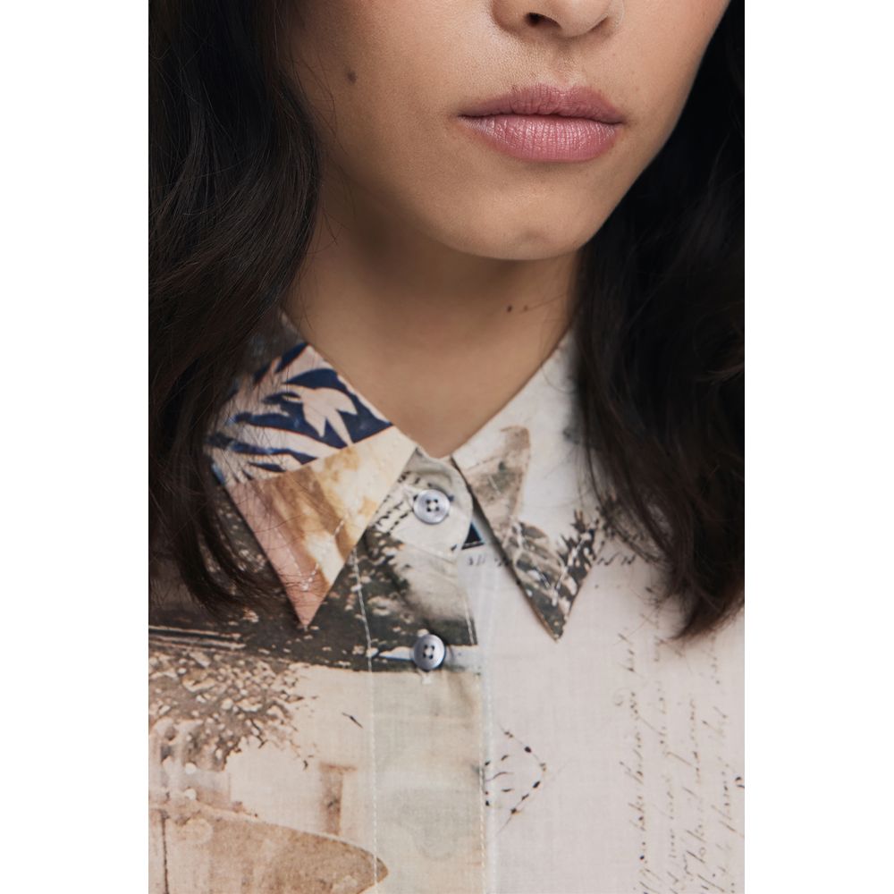 Desigual beige cotton women's shirt with a relaxed fit and stylish design, showcasing casual and comfortable fashion.
