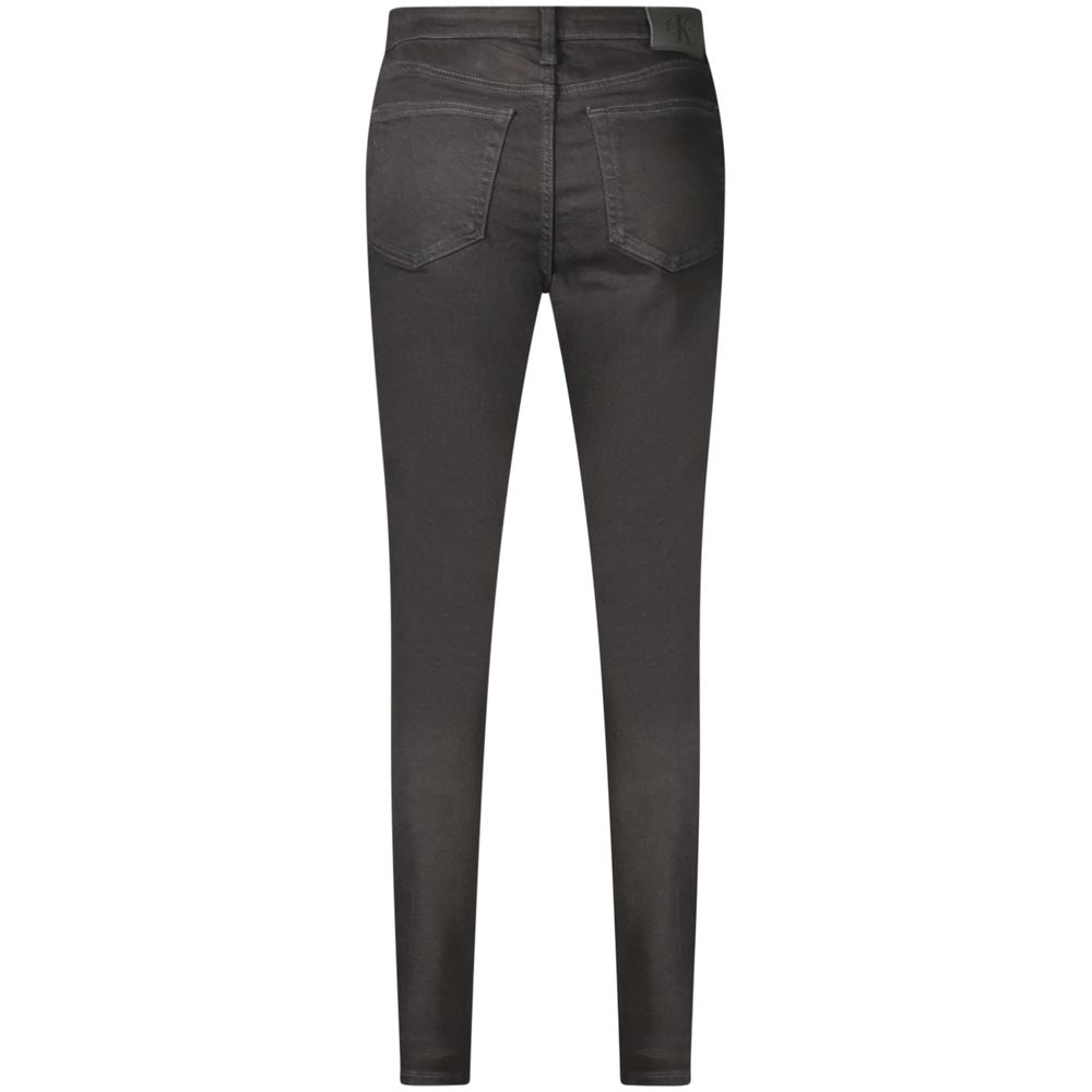 Calvin Klein black cotton women's jeans, fitted style with classic five-pocket design and belt loops, displayed on a plain background.