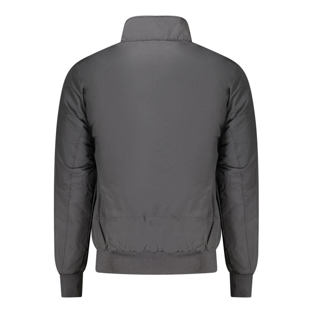 Black North Sails polyester men's jacket displayed on a hanger, showing a sleek, water-resistant outer layer.
