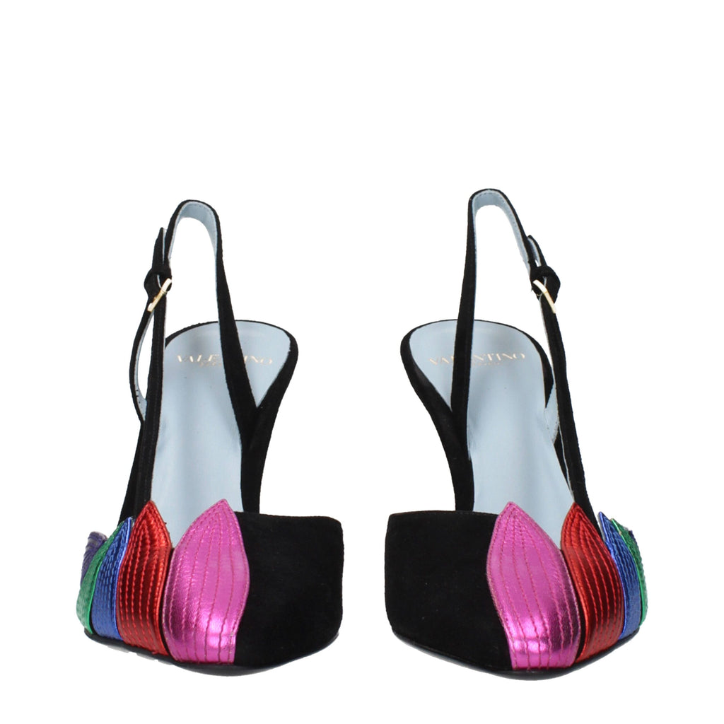 Black leather high heel pumps by Valentino Garavani with pointed toes and sleek design.