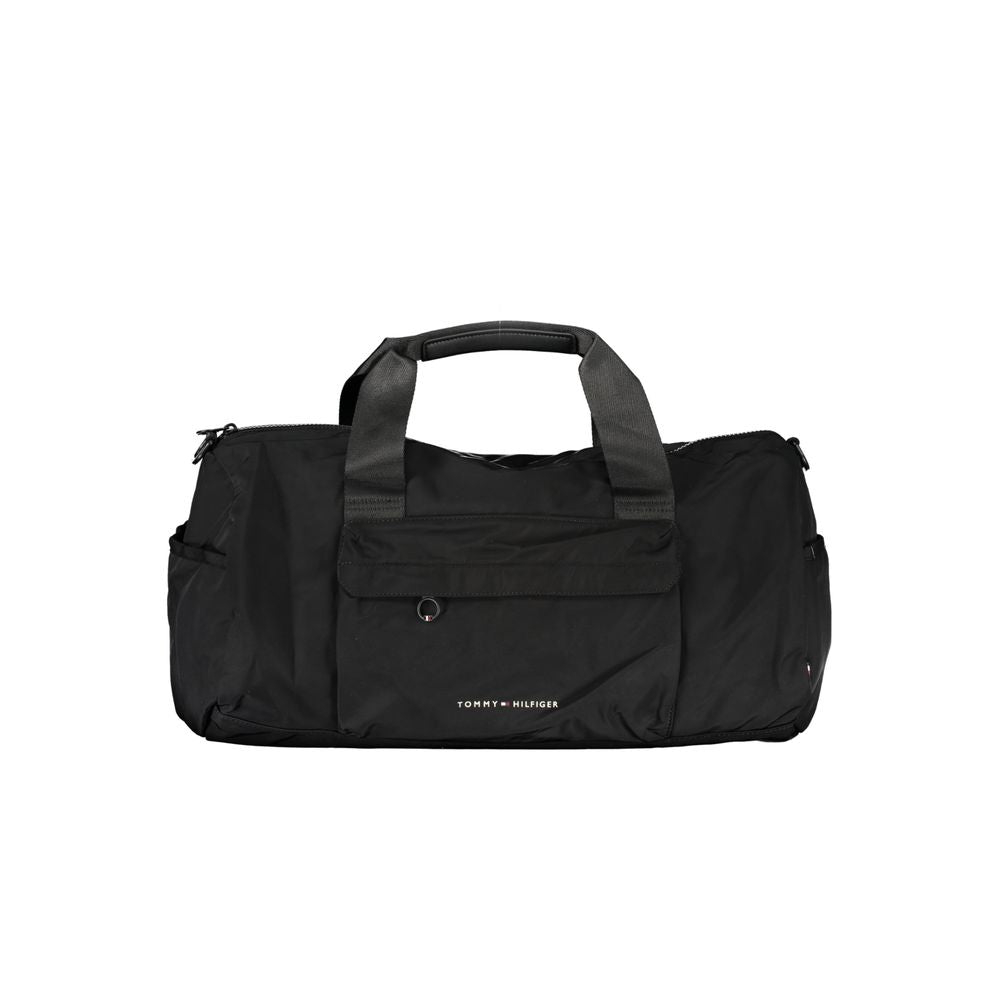 Tommy Hilfiger black polyester men's shoulder bag with adjustable strap and logo detailing.