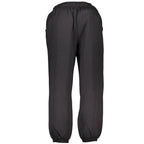 Calvin Klein black cotton men's sweatpants with elastic waistband and relaxed fit, shown on a plain background.