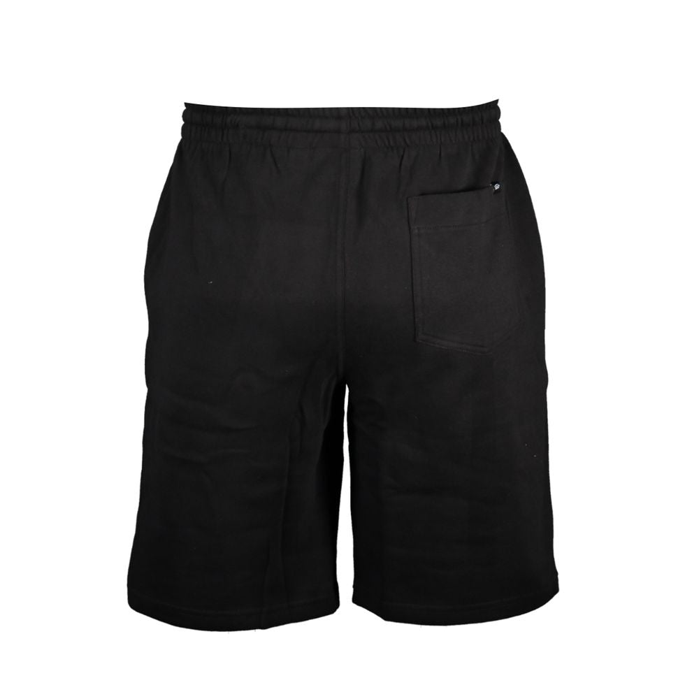 Vans black cotton men's sweatpants with elastic waistband and relaxed fit, casual athletic loungewear.