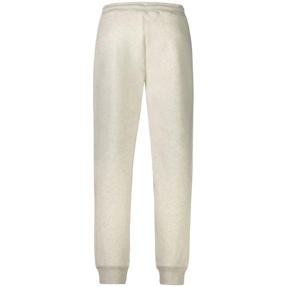 Calvin Klein grey cotton men's jogger pants with elastic waistband and tapered fit, displayed on a hanger.