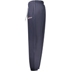 Blue cotton men's track pants by Guess Jeans, featuring a relaxed fit with elastic waistband and side pockets.
