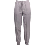 Calvin Klein Grigio cotton men's sport trousers with a relaxed fit and elastic waistband, displayed on a model.