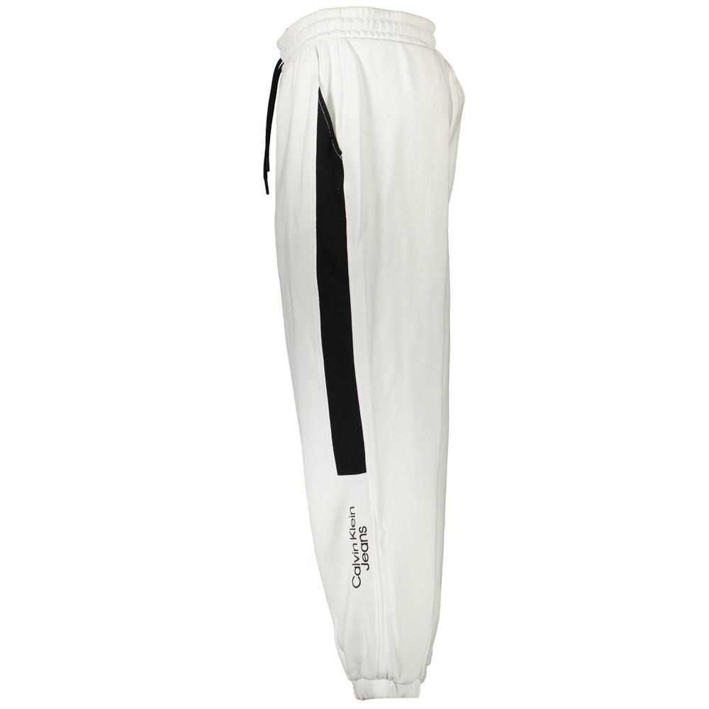 Calvin Klein white cotton men's sweatpants with elastic waistband and relaxed fit, suitable for casual wear