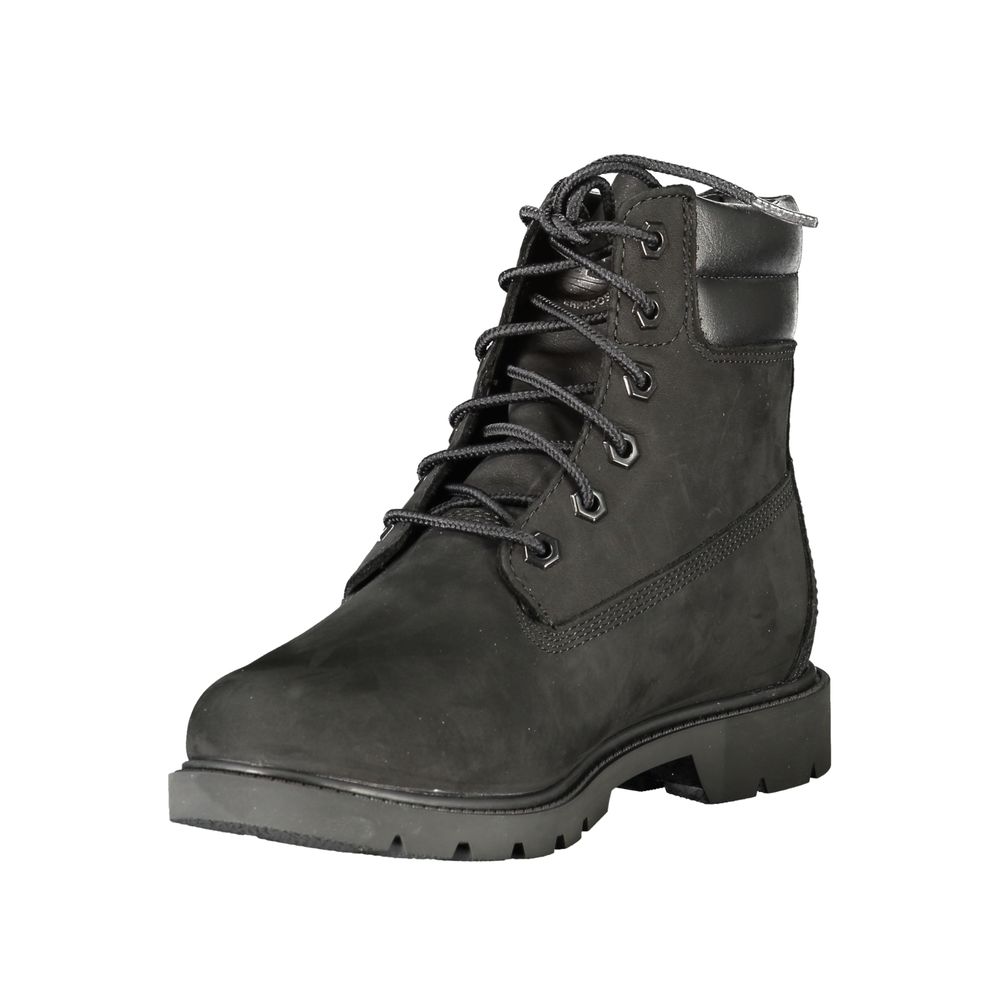 Black leather women's ankle boot by Timberland featuring a sleek design and sturdy sole, perfect for casual and outdoor wear.