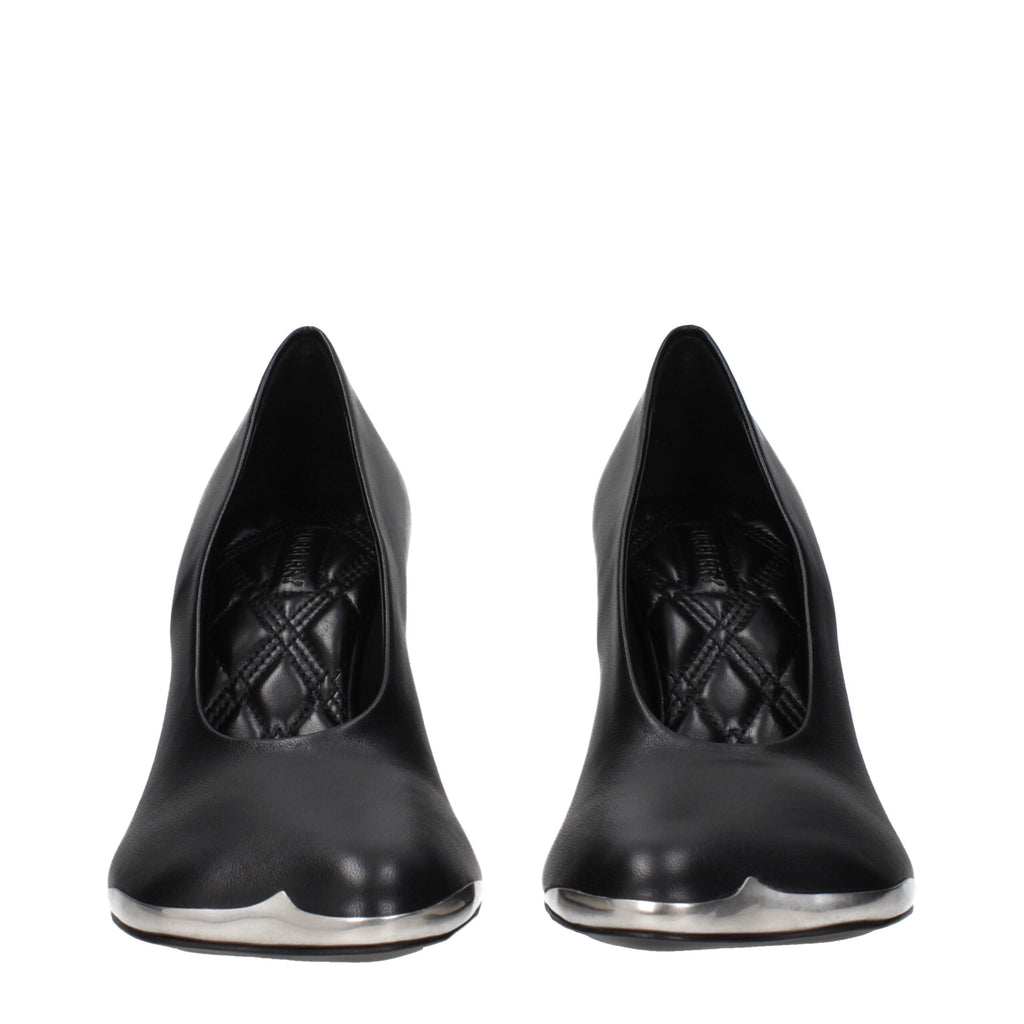Black leather high heel pumps by Burberry featuring sleek design and pointed toes, perfect for elegant and sophisticated looks.