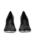 Black leather high heel pumps by Burberry featuring sleek design and pointed toes, perfect for elegant and sophisticated looks.