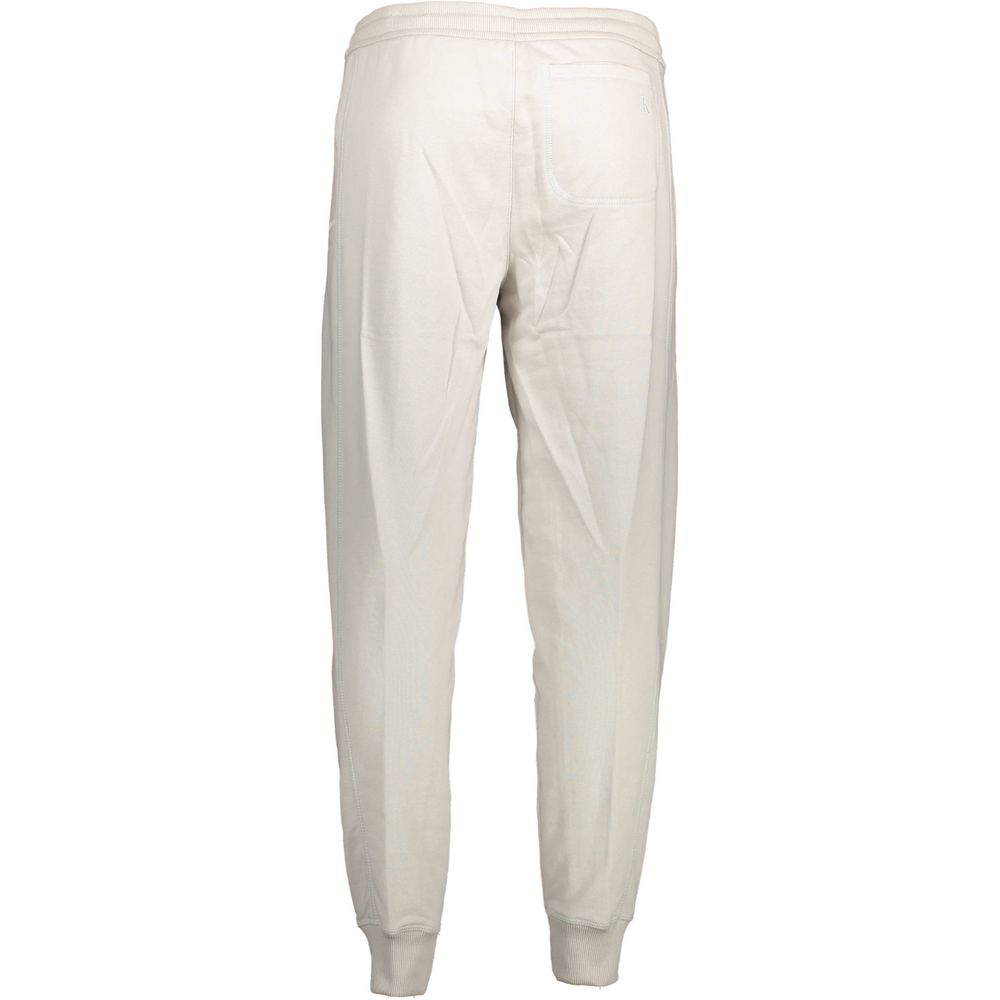 Calvin Klein Grigio cotton men's sweatpants with elastic waistband and relaxed fit, suitable for casual wear.
