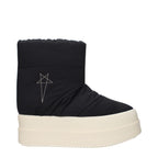Rick Owens black fabric ankle boots with sleek design and pointed toes, showcasing the stylish footwear detail.