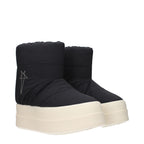 Rick Owens black fabric ankle boots with sleek design and pointed toes, stylish footwear for modern fashion.