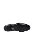 Black leather ankle boots by Celine featuring sleek design and pointed toes, perfect for stylish everyday wear.