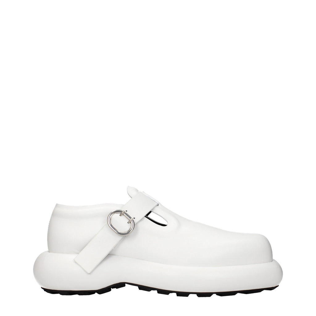 Jil Sander white leather slip-on loafers with sleek design and minimal detailing, perfect for elegant casual wear.