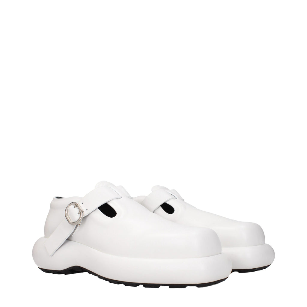 White leather Jil Sander slip-on loafers with sleek design and minimal detailing, perfect for stylish and comfortable footwear.
