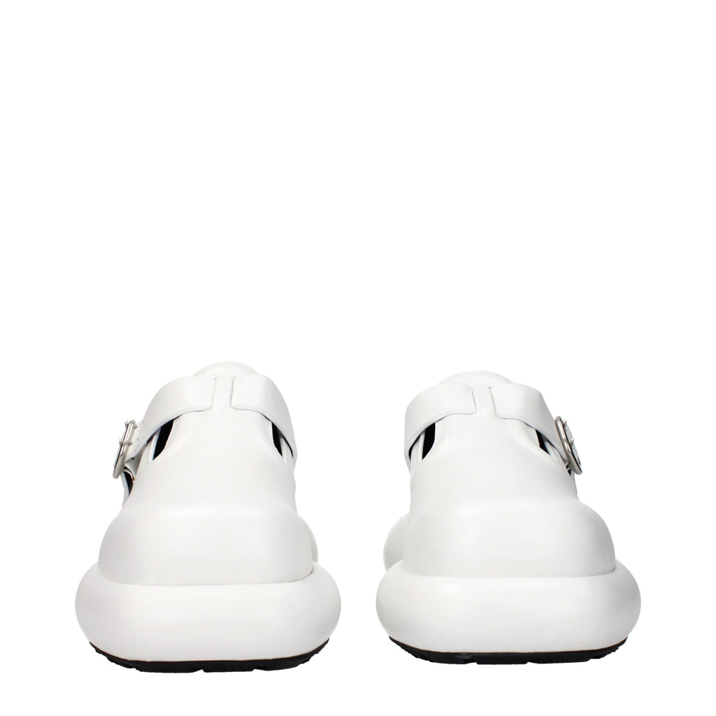 White leather slip-on loafers by Jil Sander, featuring sleek design and minimalistic style, shown on a clean background.