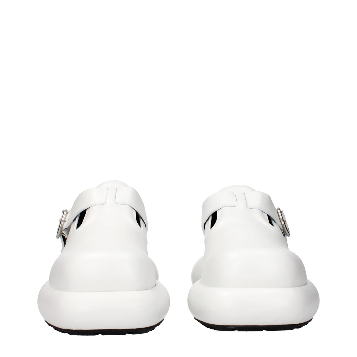 White leather slip-on loafers by Jil Sander, featuring sleek design and minimalistic style, shown on a clean background.