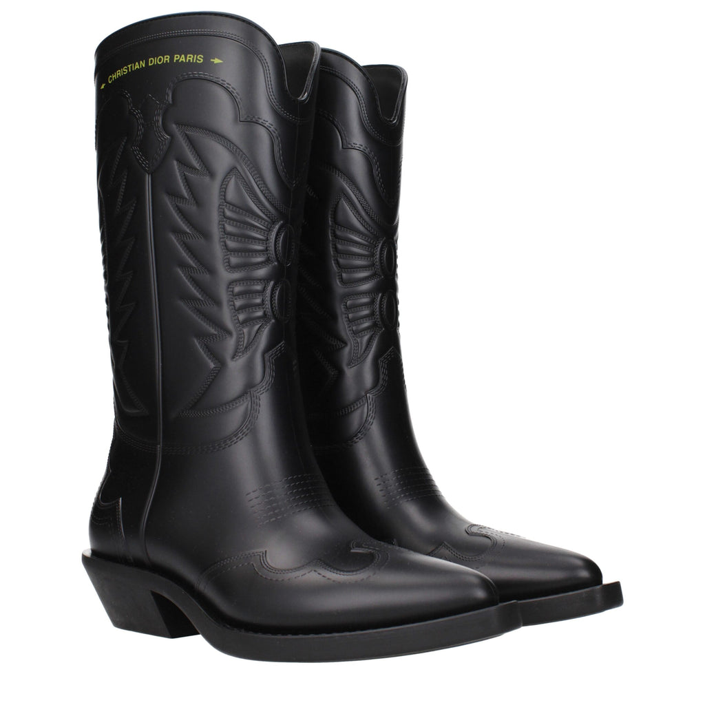 Christian Dior black cotton boots with sleek design and sturdy soles, displayed on a neutral background.