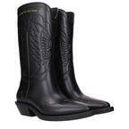 Christian Dior black cotton boots with sleek design and sturdy soles, displayed on a neutral background.