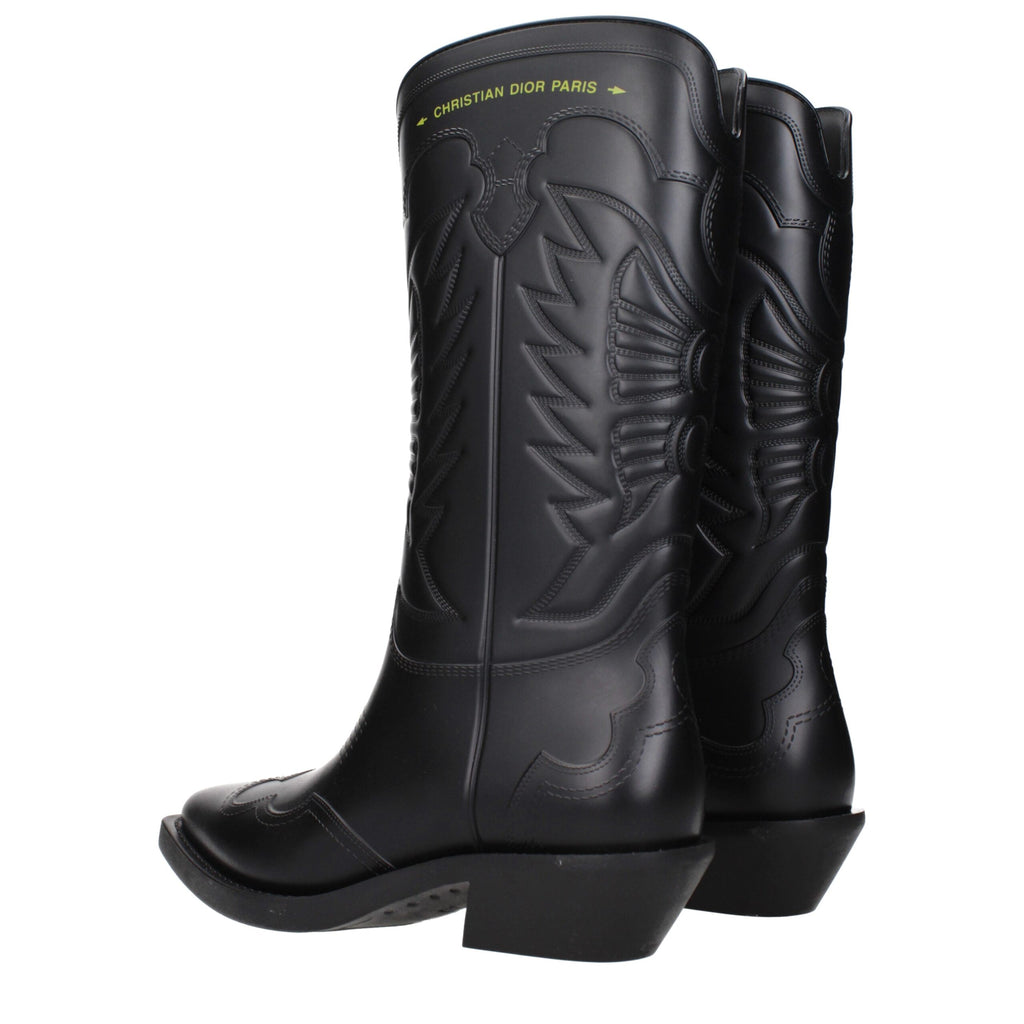 Christian Dior black cotton boots with sleek design and high-top style, featuring detailed stitching and a sturdy sole.