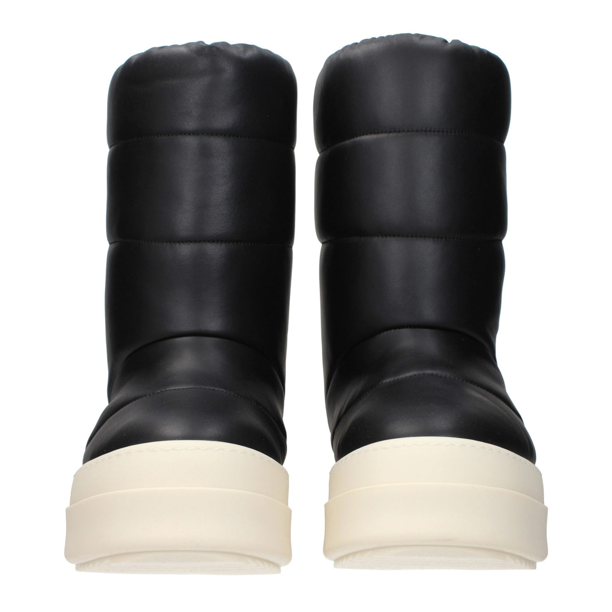 Black leather ankle boots by Rick Owens featuring sleek design and pointed toes, perfect for modern fashion styles.