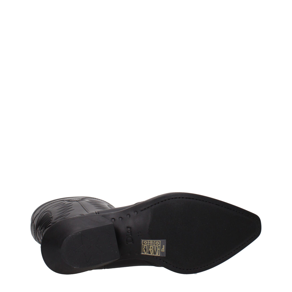 Black cotton Christian Dior boots with sleek design and sturdy sole, showcasing luxury footwear style and craftsmanship.
