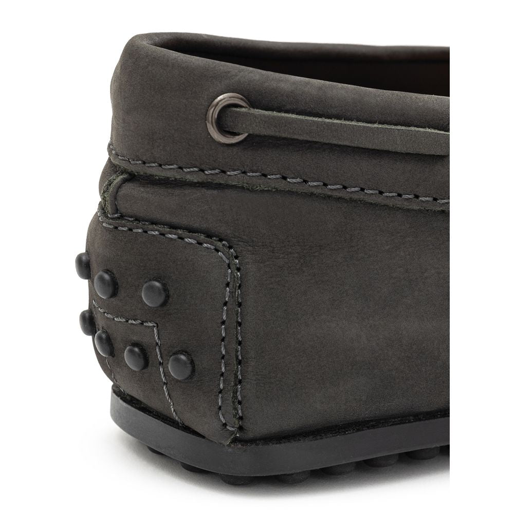 Gray Nubuc leather moccasins by Tod's featuring classic slip-on design and subtle stitching details.