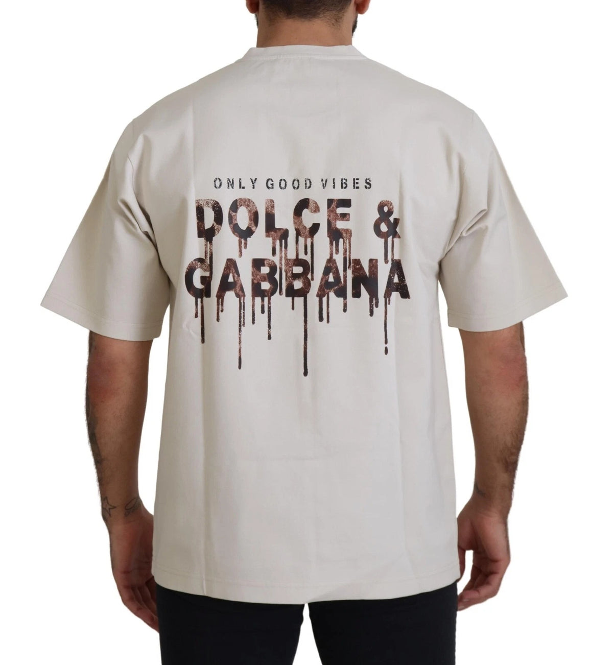Dolce & Gabbana ivory cotton crewneck sweater with printed design displayed on a hanger.