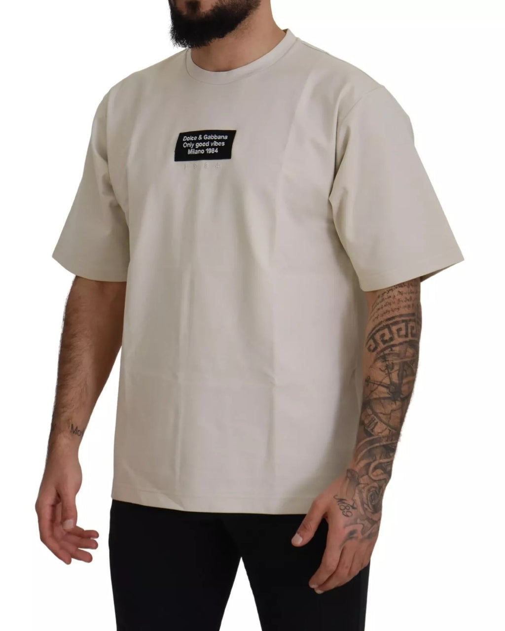 Dolce & Gabbana ivory cotton crewneck with printed design, showcasing the stylish neckline and fabric details.