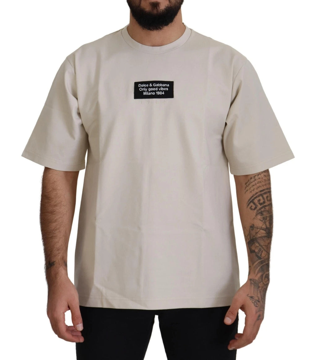 Dolce & Gabbana ivory cotton crewneck with printed design, showcasing the comfortable fabric and stylish neckline.
