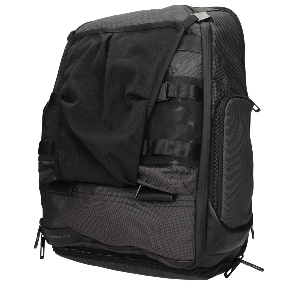 Gray fabric Piquadro backpack with adjustable straps and multiple compartments, designed for everyday use.