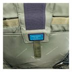 Gray fabric Piquadro backpack with adjustable straps and multiple compartments, designed for everyday use and style.