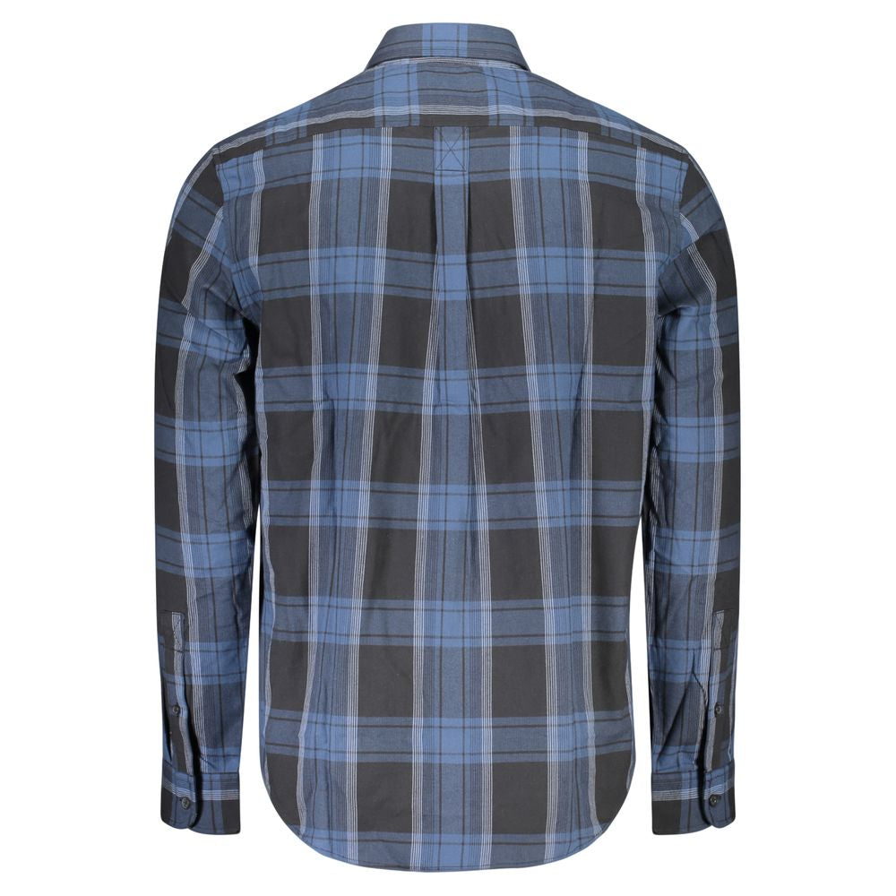 Timberland blue cotton men's shirt displayed flat, featuring a classic collar, button-down front, and long sleeves.