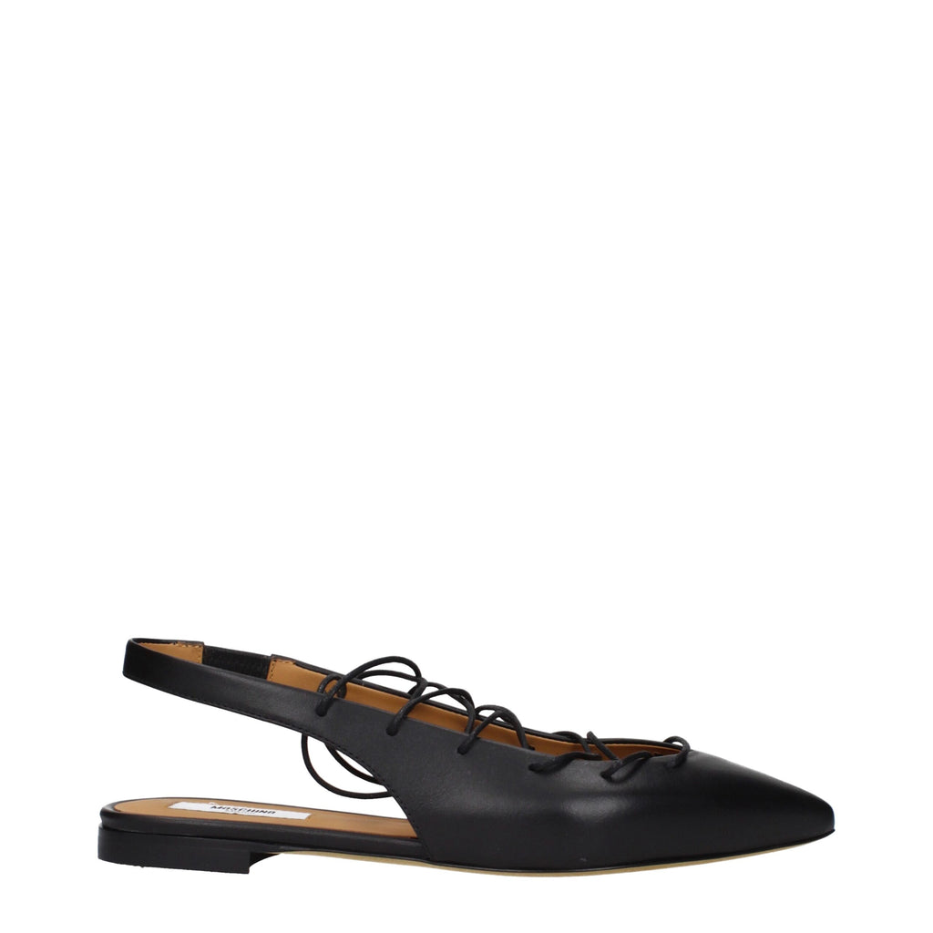 Black leather flats by Moschino with rounded toe and sleek design, perfect for casual or stylish everyday wear.