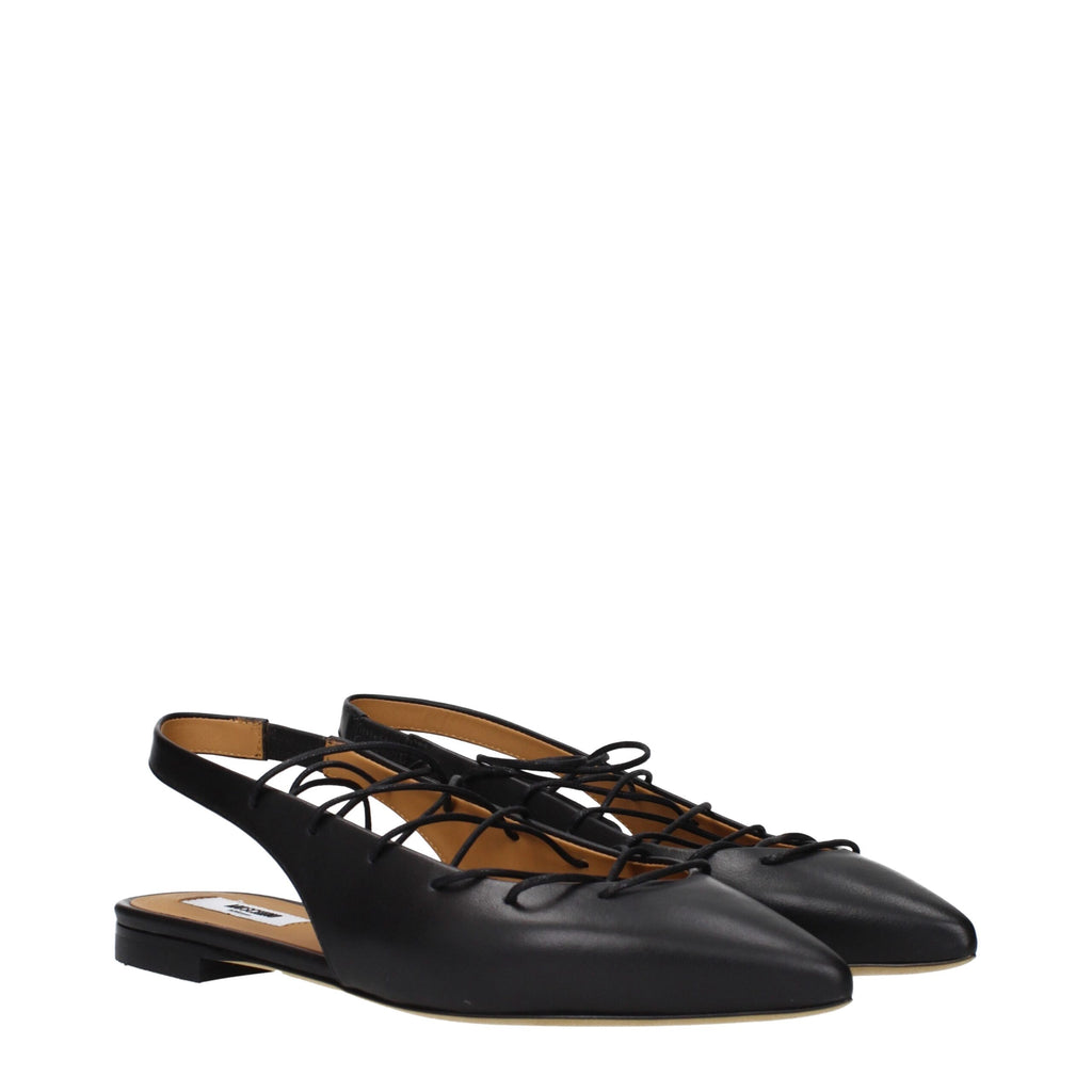 Black leather flats by Moschino featuring a sleek design and classic silhouette, perfect for casual or dressy occasions.