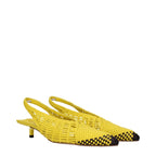 Yellow leather flat sandals by Jacquemus featuring minimalist design and ankle strap, perfect for casual summer wear.