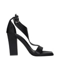 Max Mara black leather stiletto heel sandals featuring ankle straps and open toes, stylish and elegant for formal occasions.