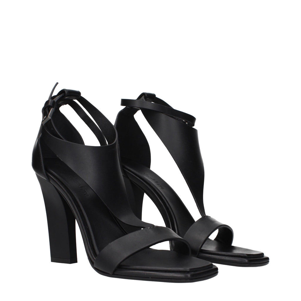 Max Mara black leather stiletto heel sandals with open toes and ankle straps, stylish footwear for elegant occasions.