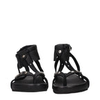 Isabel Marant black leather flat sandals with minimalist design and open toe, featuring thin straps and a comfortable sole.