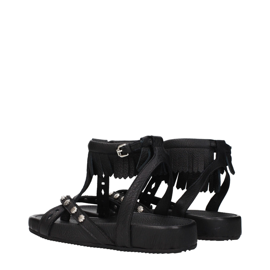 Black leather flat sandals by Isabel Marant featuring minimalist design and slip-on style for casual, stylish wear.