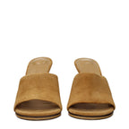 Brown leather Jacquemus stiletto heel sandals with open toe and ankle strap, stylish footwear for elegant summer looks.