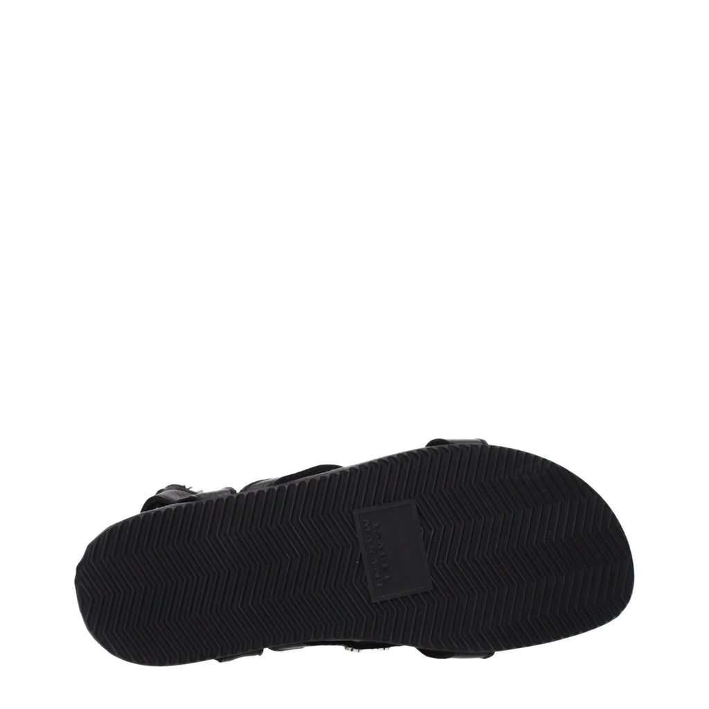 Black leather flat sandals by Isabel Marant with minimalist design and slim straps, perfect for casual and chic summer outfits.
