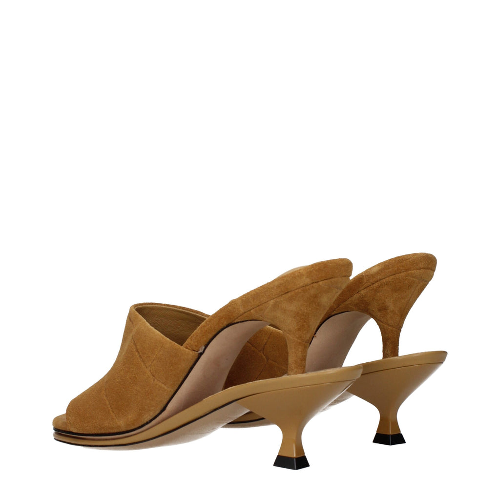 Jacquemus brown leather stiletto heel sandals with thin straps and open toes, stylish footwear for elegant summer outfits.