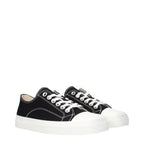 Black fabric low top sneakers by Moschino with stylish design and lace-up closure, perfect for casual and trendy outfits.