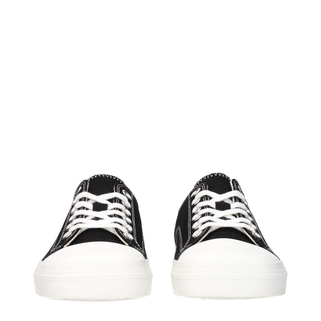 Moschino black fabric low top sneakers with white soles and stylish design, ideal for casual wear and everyday fashion.